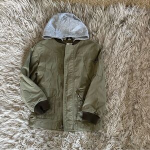 Zip up jacket with hood.